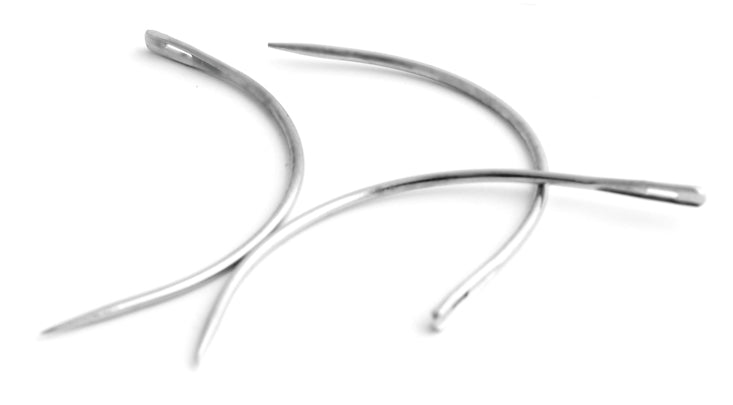Curved sewing needle